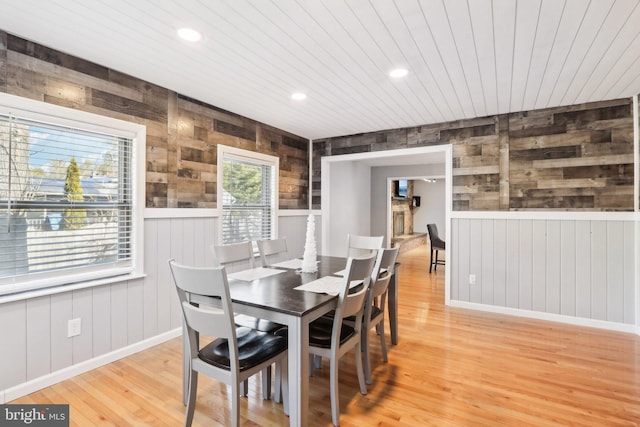 dining space featuring wood ceiling and hardwood / wood-style flooring