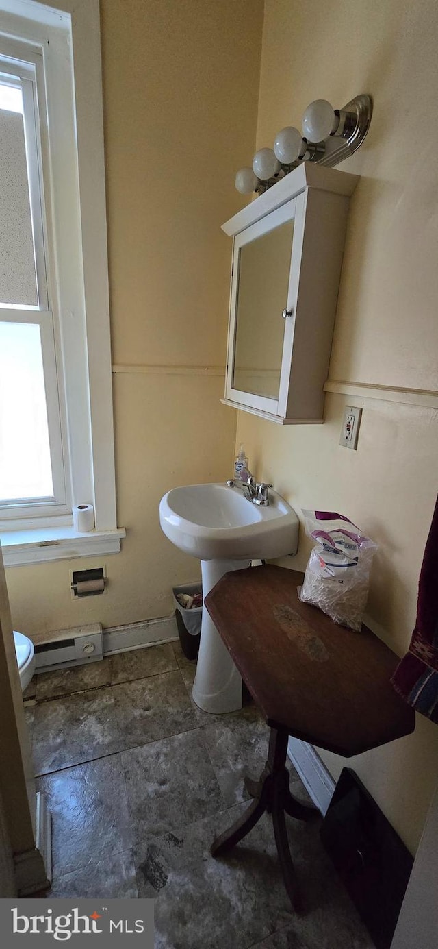 bathroom featuring toilet