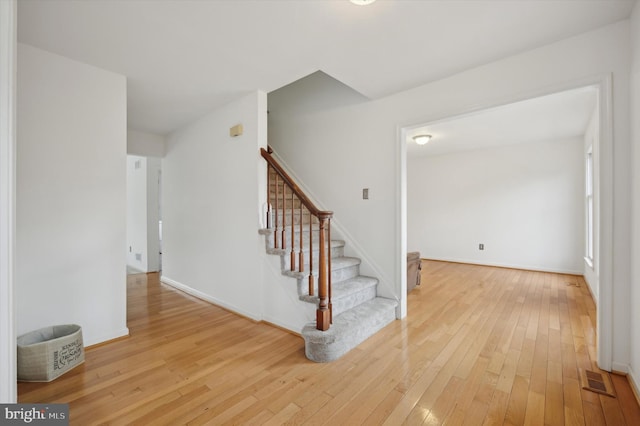 interior space with hardwood / wood-style floors