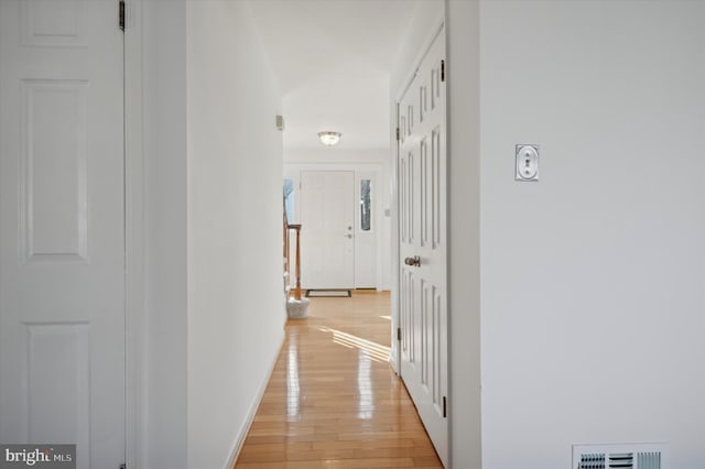 hall featuring light wood-type flooring