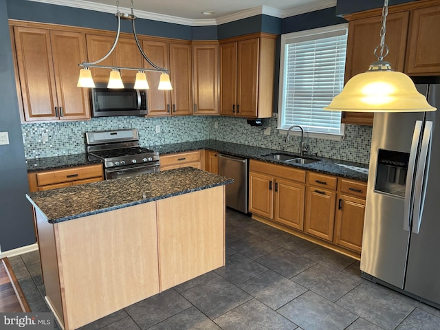 kitchen featuring a kitchen island, a sink, appliances with stainless steel finishes, backsplash, and crown molding