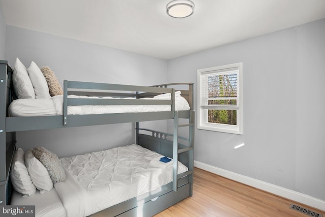 bedroom featuring hardwood / wood-style floors