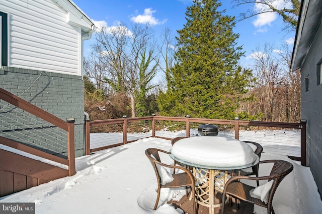 view of snow covered deck