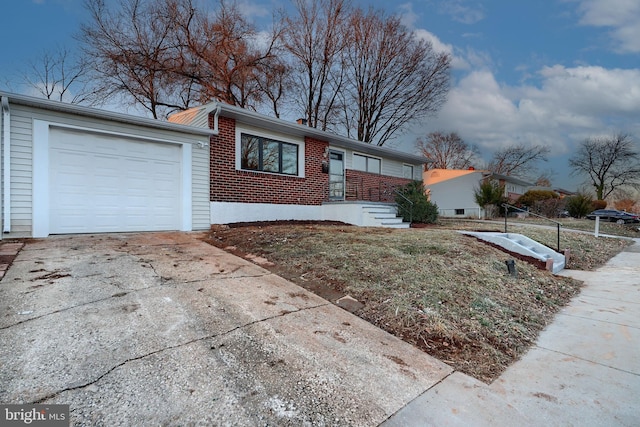 single story home featuring a garage