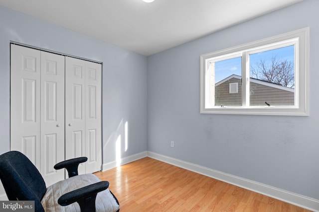 office area with light hardwood / wood-style flooring