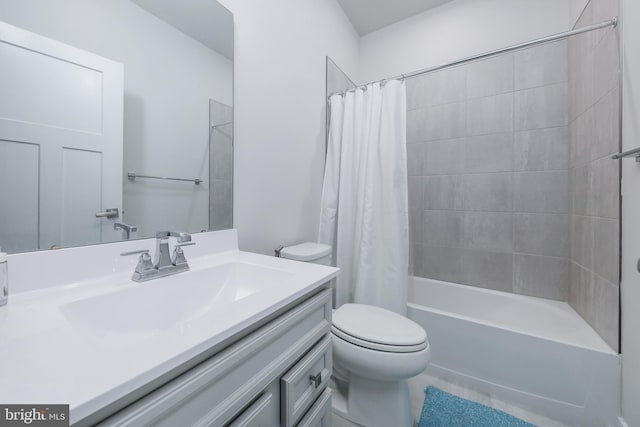 full bathroom featuring shower / bathtub combination with curtain, vanity, and toilet