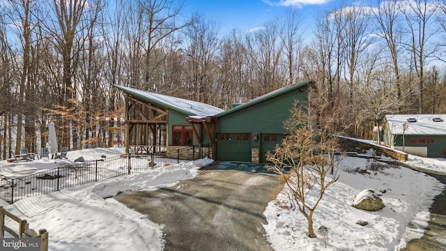 view of front of home with a garage