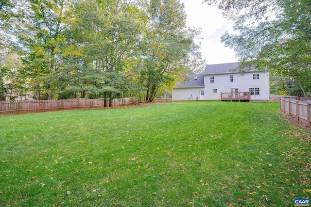 view of yard with a deck