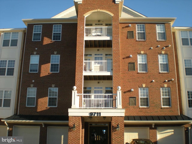 view of building exterior with an attached garage