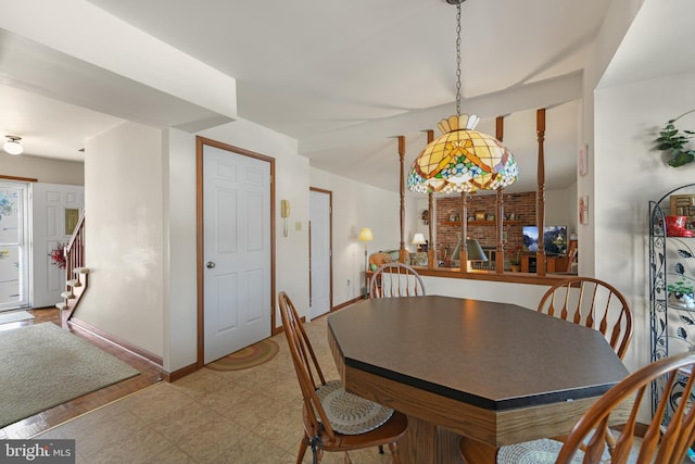 dining area with stairway and baseboards