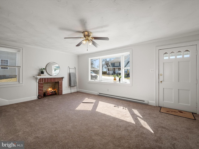 foyer featuring ornamental molding, a baseboard radiator, a fireplace, and carpet flooring