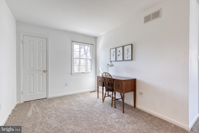 carpeted home office with baseboards and visible vents