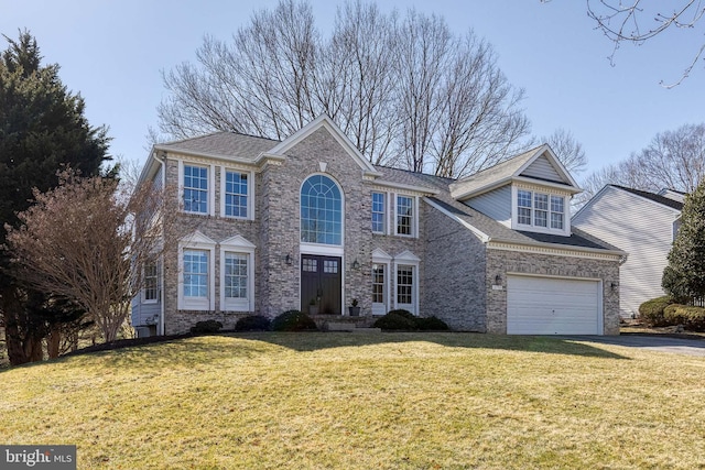 traditional-style home featuring driveway, a garage, a front lawn, and brick siding