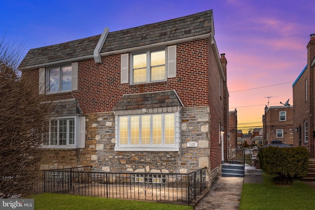 view of property exterior at dusk