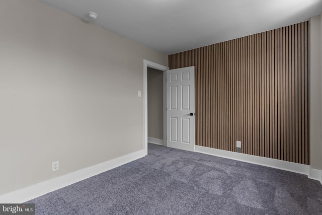 spare room featuring carpet flooring