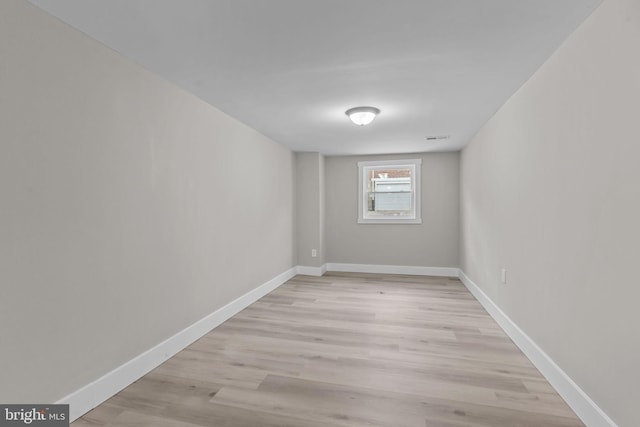 unfurnished room featuring light wood-type flooring