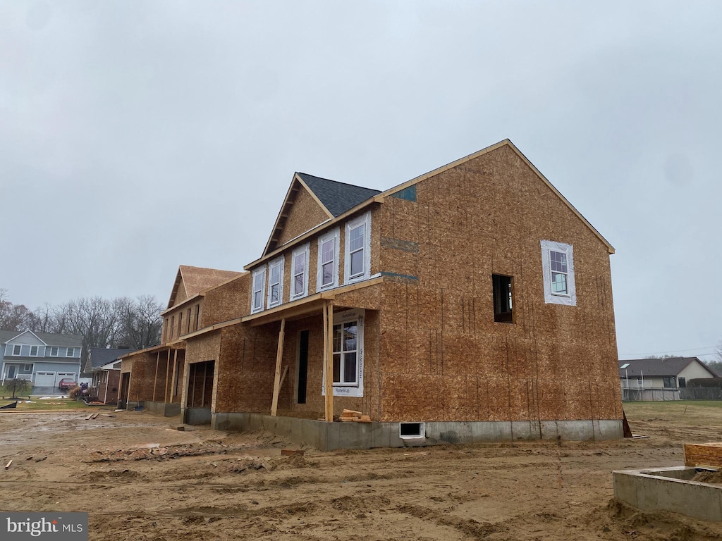 view of side of home with a garage