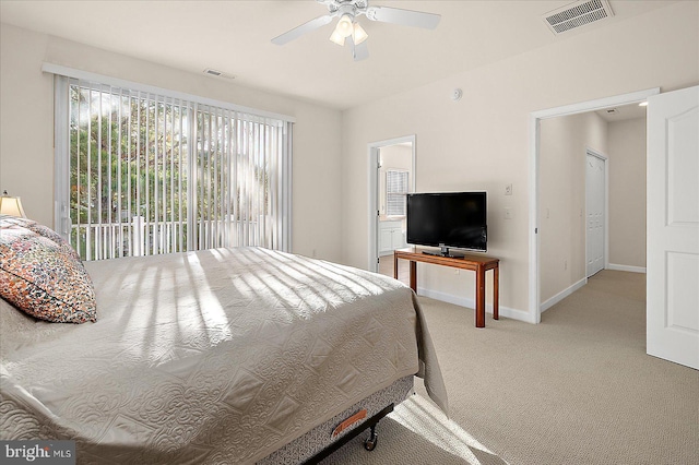 bedroom featuring ceiling fan and carpet