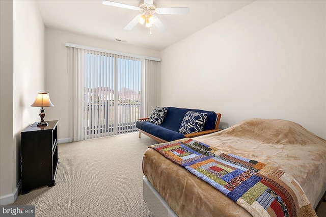 carpeted bedroom with access to outside and ceiling fan