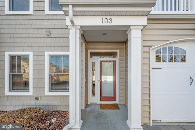 property entrance featuring a garage