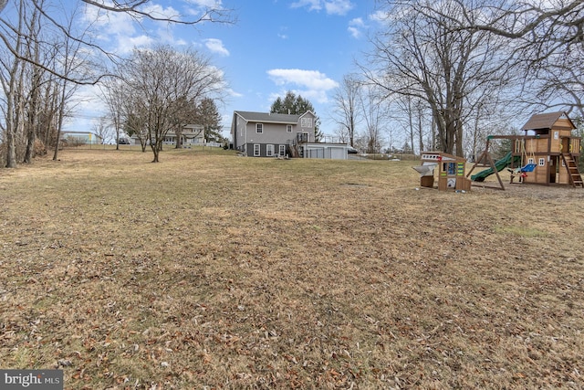 view of yard with a playground