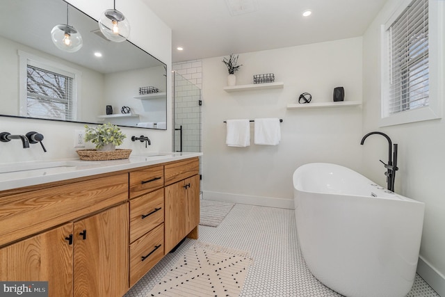 bathroom with vanity, tile patterned floors, and independent shower and bath