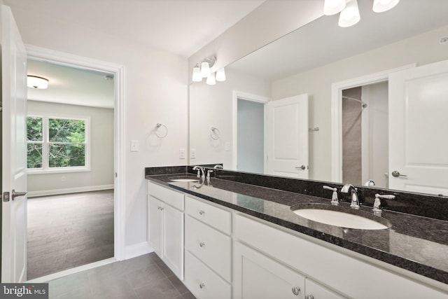 bathroom featuring vanity and tile patterned floors