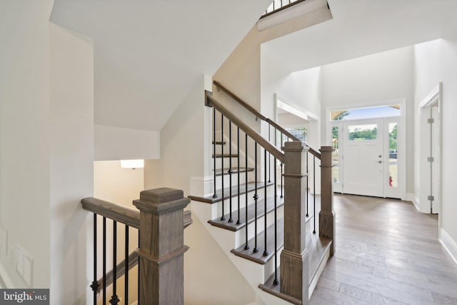 stairs with wood-type flooring