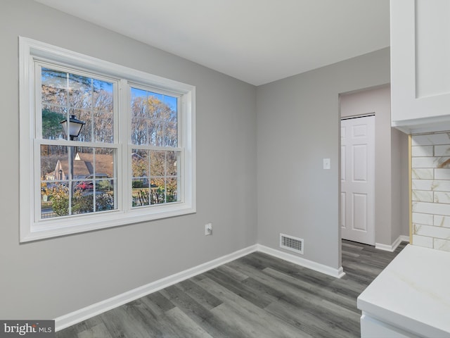 dining area featuring dark hardwood / wood-style floors