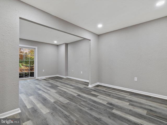 unfurnished room featuring hardwood / wood-style floors