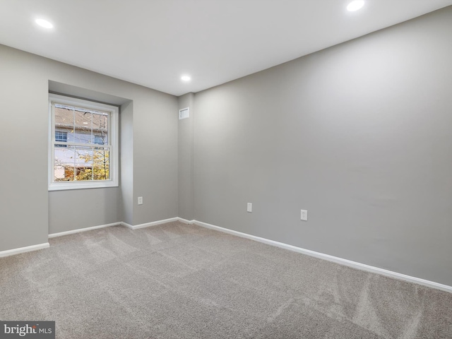 view of carpeted spare room