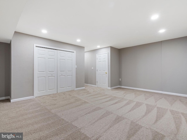 interior space featuring light colored carpet