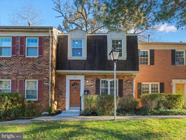 view of property with a front yard