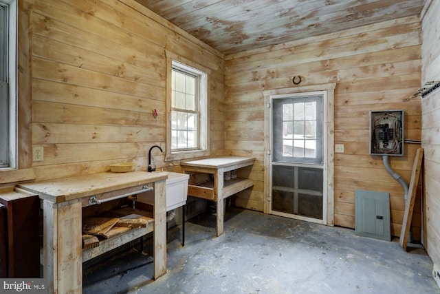 misc room with wooden ceiling and wood walls