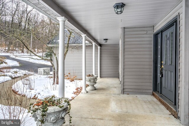 view of snow covered patio