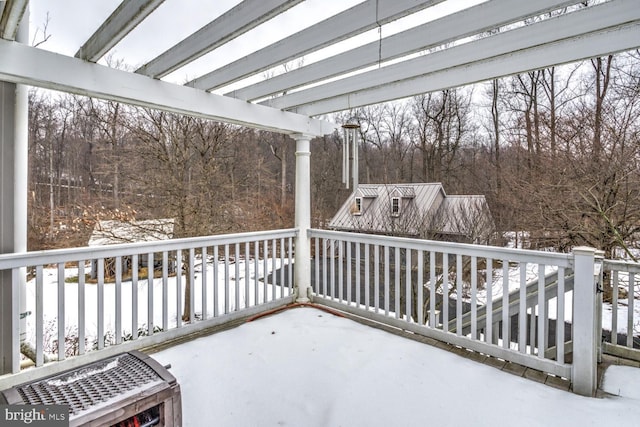 view of snow covered deck