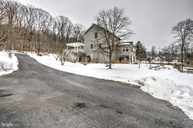 view of snow covered property