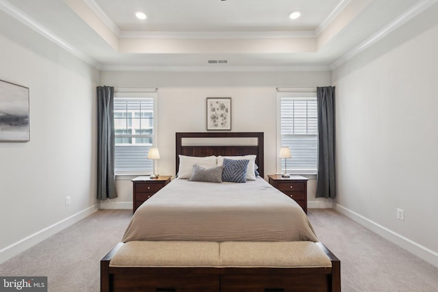 carpeted bedroom featuring a raised ceiling, ornamental molding, and multiple windows