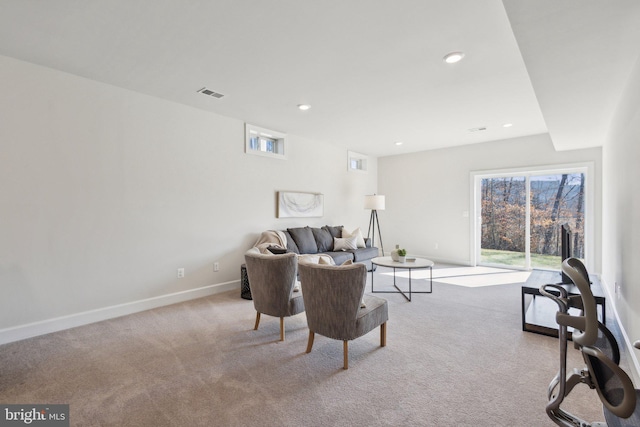 living room with light colored carpet