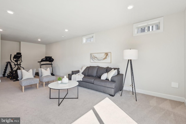 living room featuring light colored carpet