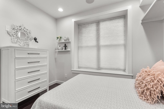 bedroom featuring dark wood-type flooring