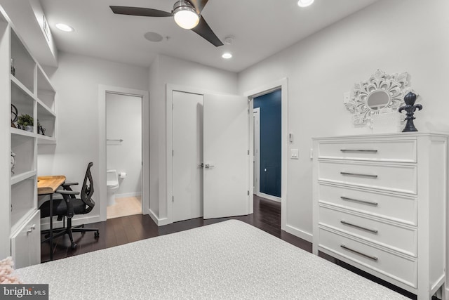 bedroom featuring ceiling fan, connected bathroom, and dark hardwood / wood-style flooring