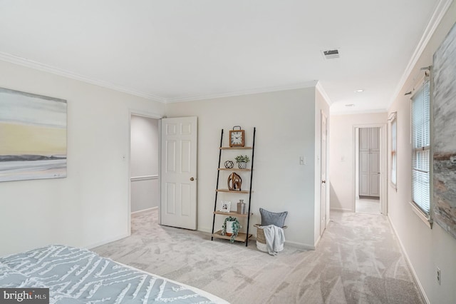 unfurnished bedroom with crown molding and light carpet