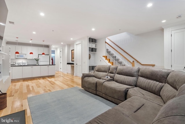 living room featuring light hardwood / wood-style flooring