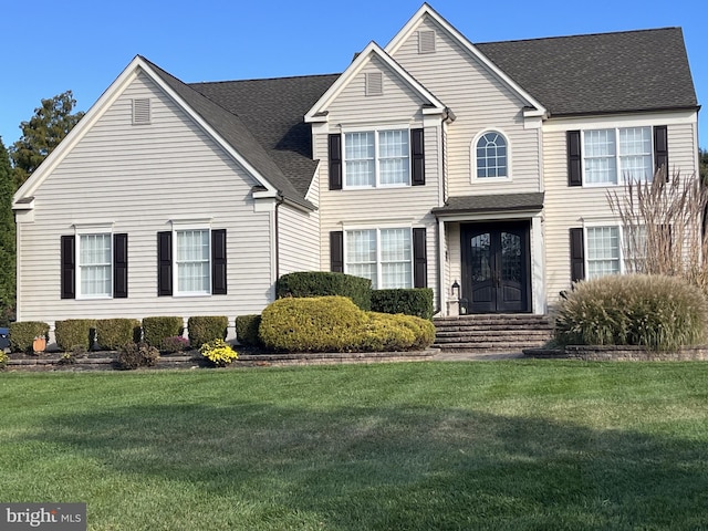 view of front facade featuring a front lawn