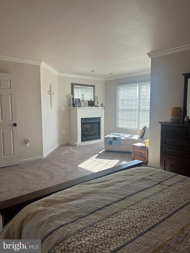 carpeted bedroom with ornamental molding