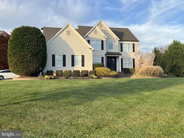 front of property with a front lawn