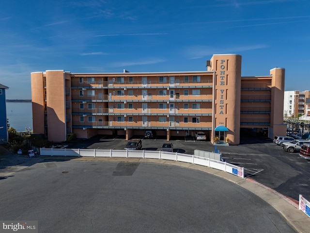 view of building exterior with a water view