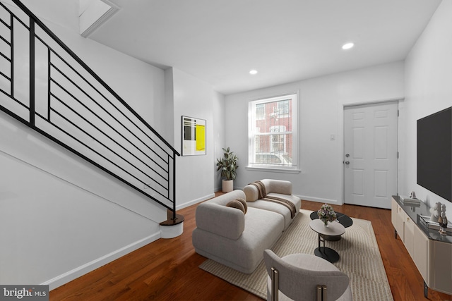 living room with dark wood-type flooring