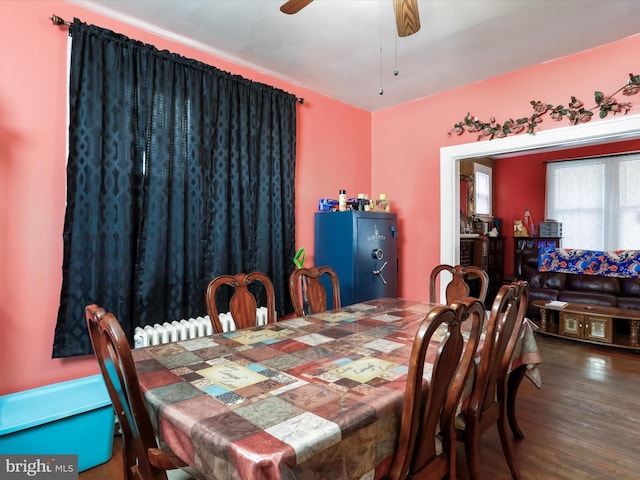 dining space featuring hardwood / wood-style floors and ceiling fan